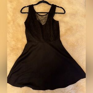 Black skater dress. Lace pattern.